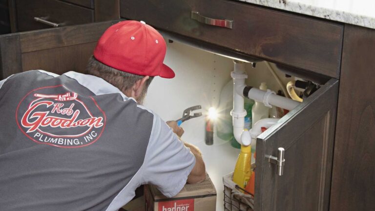 rob working on plumbing